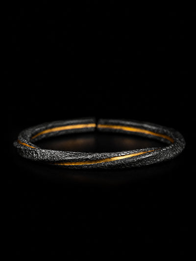 Spiraled Flesh · Golden Fracture