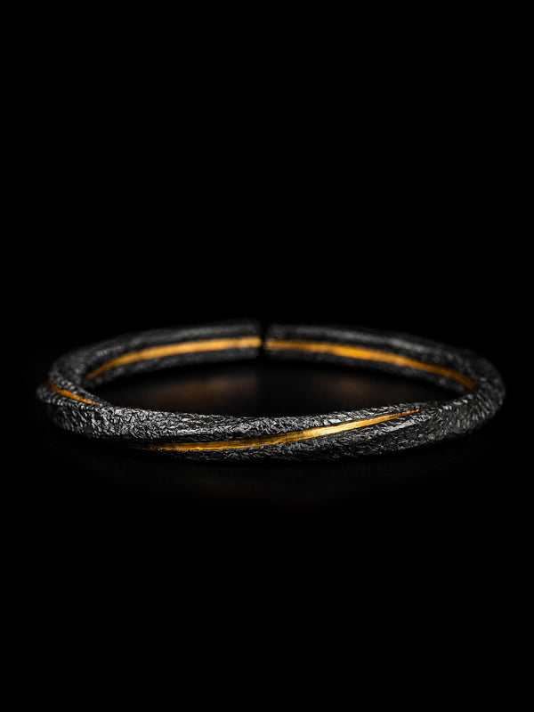Spiraled Flesh · Golden Fracture
